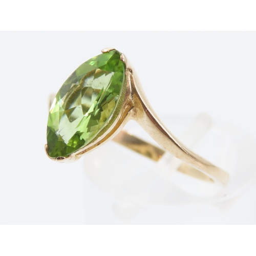 1359 - Peridot Ladies Ring Mounted on 9 Carat Yellow Gold Band Ring Size O and A Half