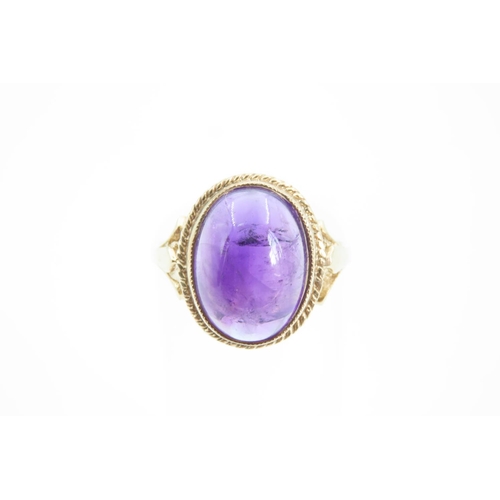 1360 - Cabochon Cut and Polished Oval Set Amethyst Centre Stone Ring Mounted on 9 Carat Yellow Gold Band Ri... 