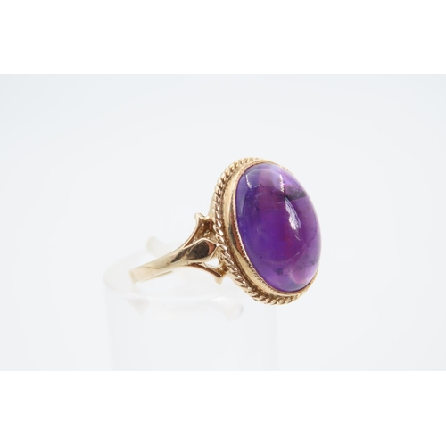 1360 - Cabochon Cut and Polished Oval Set Amethyst Centre Stone Ring Mounted on 9 Carat Yellow Gold Band Ri... 