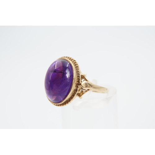 1360 - Cabochon Cut and Polished Oval Set Amethyst Centre Stone Ring Mounted on 9 Carat Yellow Gold Band Ri... 