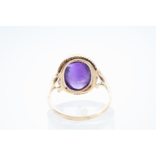 1360 - Cabochon Cut and Polished Oval Set Amethyst Centre Stone Ring Mounted on 9 Carat Yellow Gold Band Ri... 