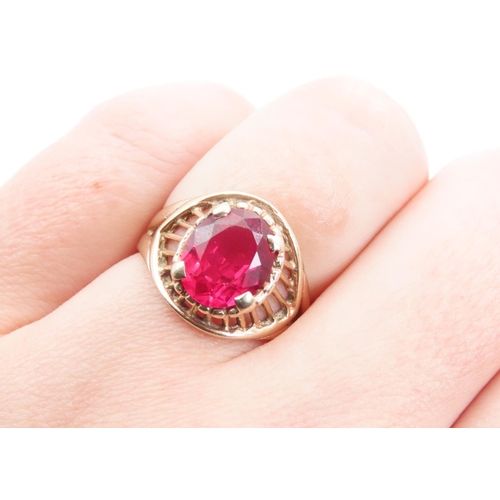 1370 - Red Garnet Centre Stone Ring Mounted on 9 Carat Yellow Gold Band Ring Size M