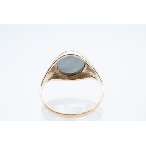 1388 - Hematite Intaglio Ring Mounted on 9 Carat Yellow Gold Band Ring Size T and a Half