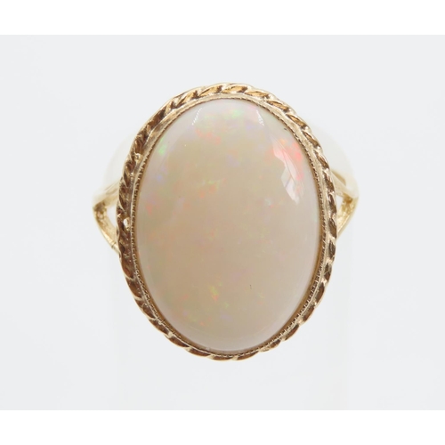 1394 - Opal Centre Stone Ring Mounted on 9 Carat Yellow Gold Band Ring Size O