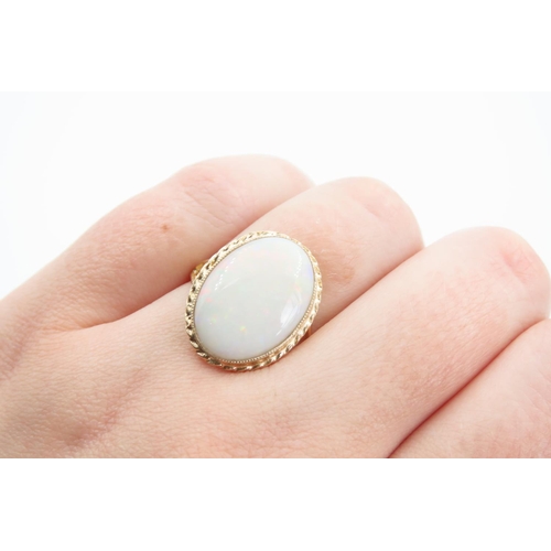 1394 - Opal Centre Stone Ring Mounted on 9 Carat Yellow Gold Band Ring Size O