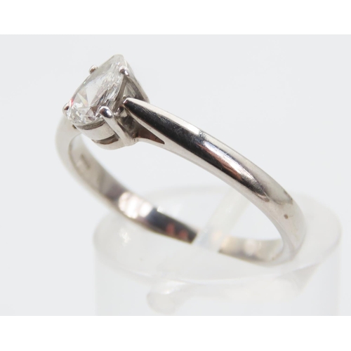 1398 - Diamond Solitaire Ring Pear Cut Mounted on Platinum Set on Platinum Band Ring Size O