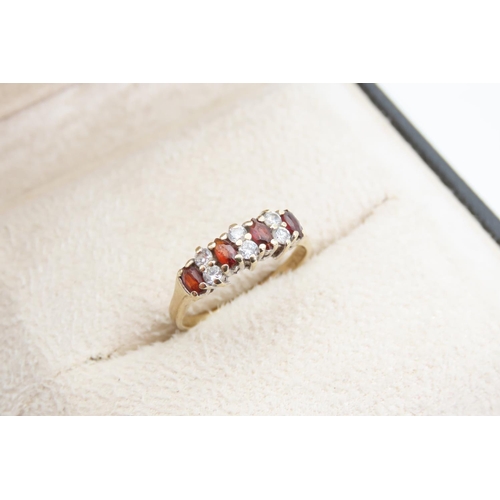 1407 - Garnet Four Stone and Diamond Band Ring Platinum Set Mounted on 9 Carat Gold Size K