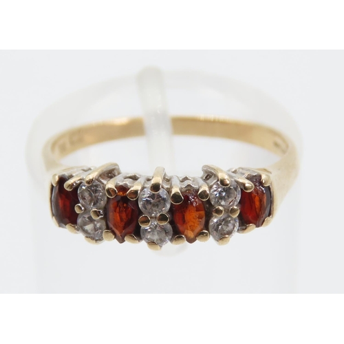 1407 - Garnet Four Stone and Diamond Band Ring Platinum Set Mounted on 9 Carat Gold Size K