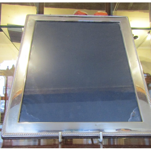 141 - Silver Rectangular Form Photograph Frame Approximately 12 Inches High x 8 Inches Wide