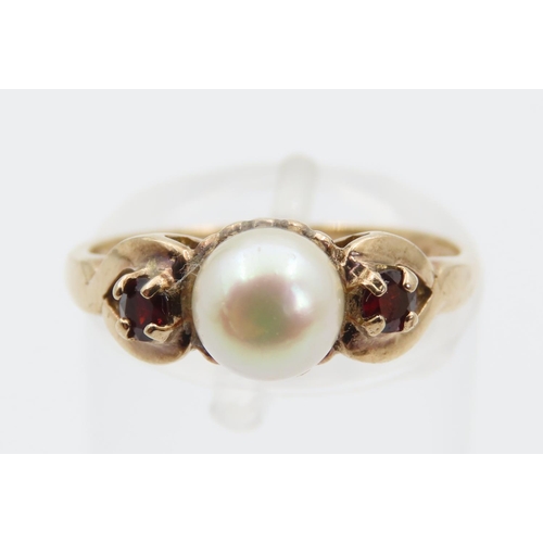 1412 - Pearl and Garnet Ladies Ring Mounted on 9 Carat Yellow Gold Ring Size M