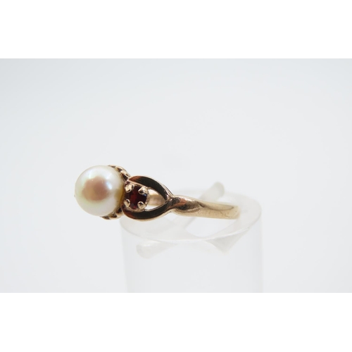 1412 - Pearl and Garnet Ladies Ring Mounted on 9 Carat Yellow Gold Ring Size M