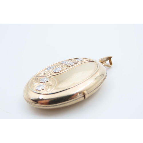 1413 - 9 Carat Yellow Gold Hinged Locket with Engraved Floral Motif Detailing 4cm High