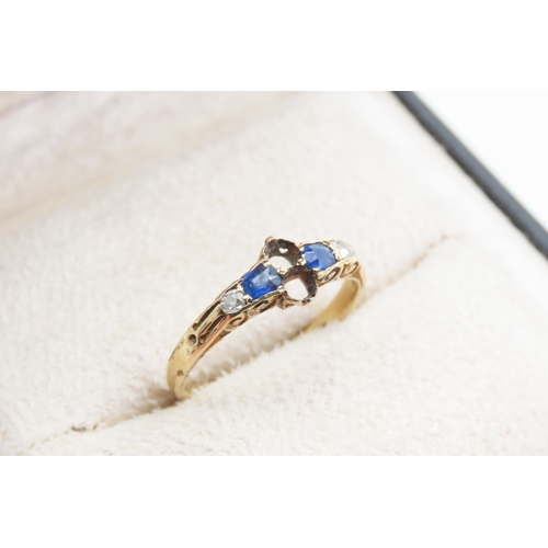 1424 - Sapphire and Diamond 18 Carat Yellow Gold Ring Four Stone Ring Band Size N. Please Note Two Centre S... 