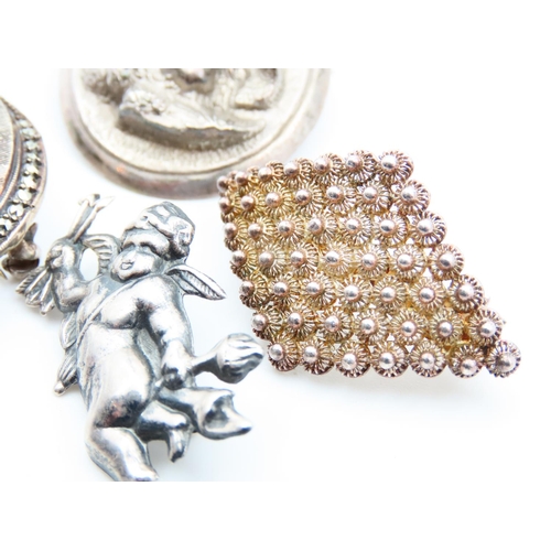 1435 - Four Silver Brooches One Cherub Motif Example