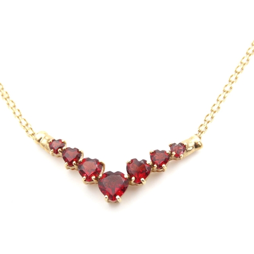 1466 - Red Garnet Set Seven Stone Graduated Form Necklace Mounted in 9 Carat Yellow Gold Further Set on 9 C... 