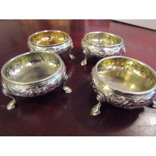 167 - Four Georgian Silver Salt Cauldrons with Embossed Floral Design above Shaped Supports Hallmarked Lon... 