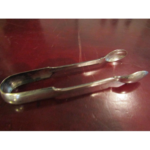 179 - Silver Sugar Thongs Restrained Design Approximately 14cm Long