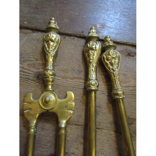 182 - Three Antique Cast Brass Fire Irons