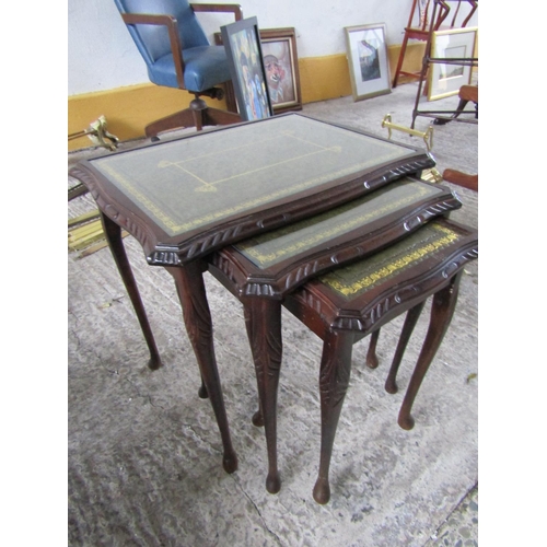 218 - Nest of Three Mahogany Graduated Form Occasional Tables Glazed Top Each with Green Leather Gilt Tool... 