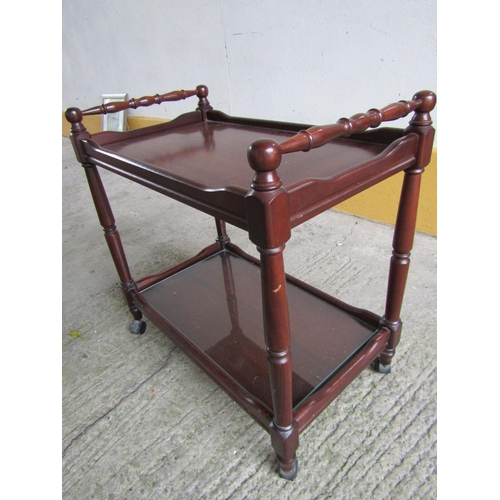 242 - Rossmore Mahogany Serving Trolley Twin Shelf Turned Rail Decoration