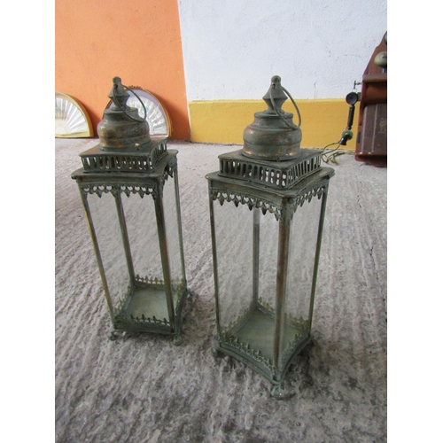 286 - Pair of Metal Framed Cake Storm Lanterns Each Approximately 20 Inches High