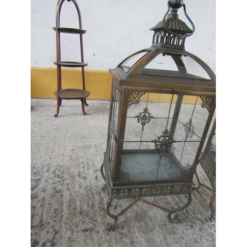 299 - Pair of Metal Framed Glass Inset Candle Storm Lanterns Shaped Supports Each Approximately 28 Inches ... 