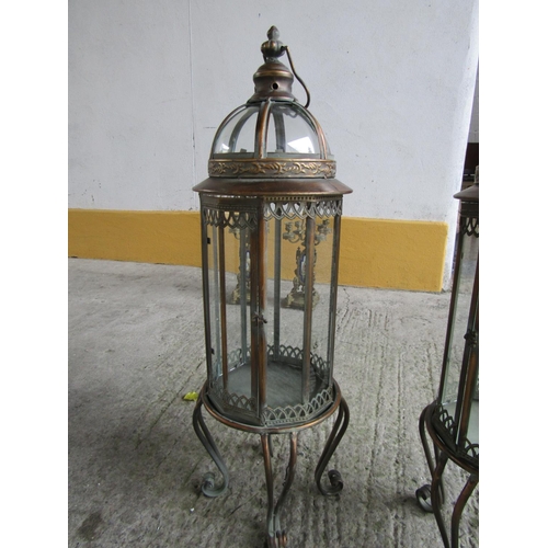 314 - Pair of Metal Lanterns Integral Supports Scroll Form Each Approximately 32 Inches High