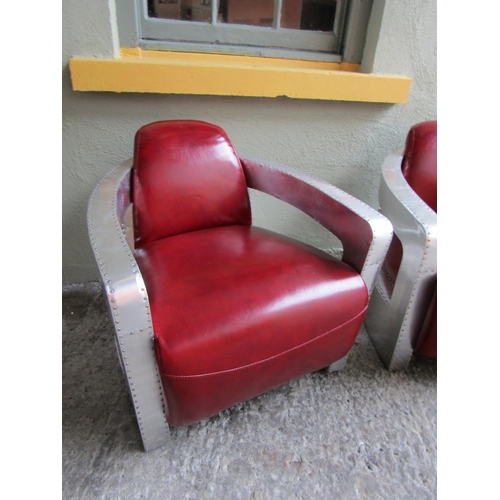 327 - Pair of Aviator Aluminium Clad Burgundy Leather Upholstered Armchairs Generous Form