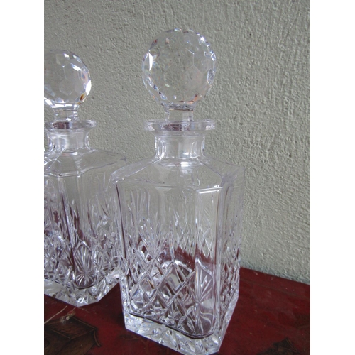 332 - Set of Three Cut Crystal Decanters with Original Crystal Stoppers Each Approximately 10 Inches High