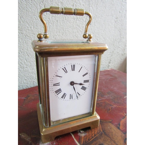 350 - Brass Bound Carriage Clock Roman Numeral Decorated Enamel Dial Clock Approximately 5 Inches High