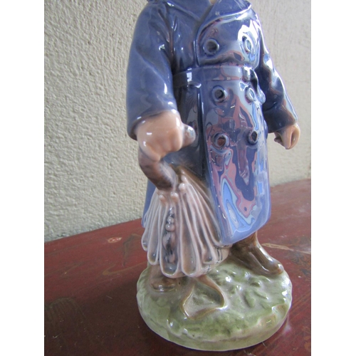 372 - Royal Copenhagen Porcelain Figure of Young Boy with Coat Attractively Detailed Approximately 7 Inche... 