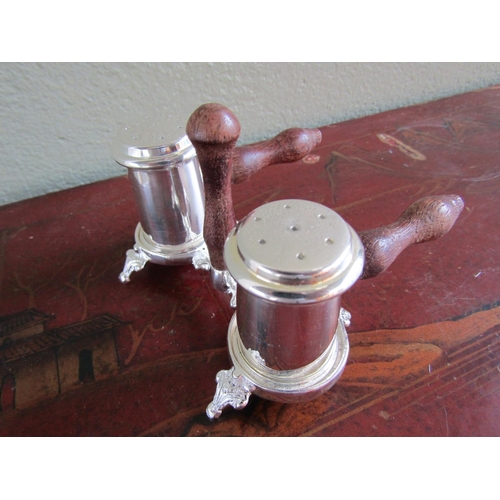 373 - Twin Set Salt and Pepper with Integral Rest Each with Turned Wooden Handle Shaped Supports Approxima... 