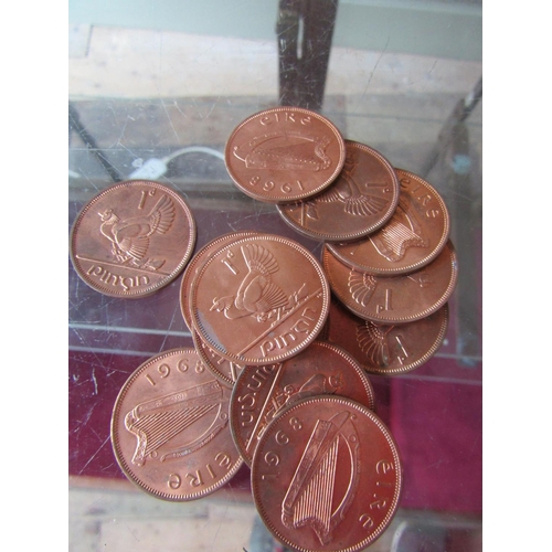 Twelve Uncirculated Irish Pennies
