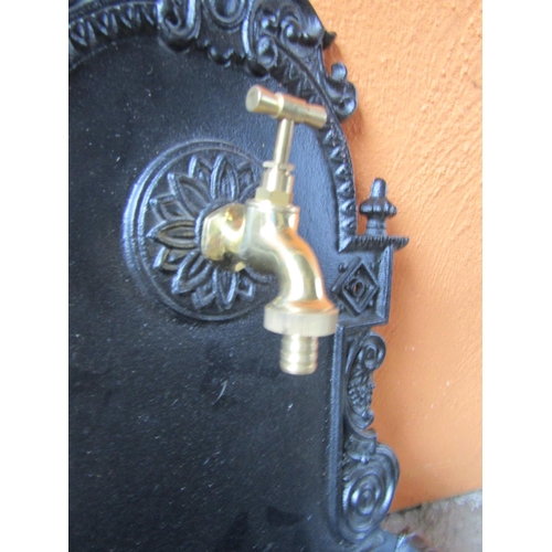 78 - Cast Iron Wall Fountain with Brass Tap Approximately 24 Inches High