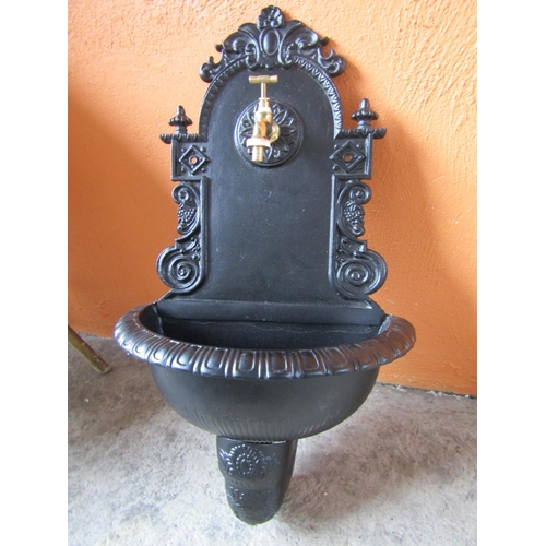 78 - Cast Iron Wall Fountain with Brass Tap Approximately 24 Inches High