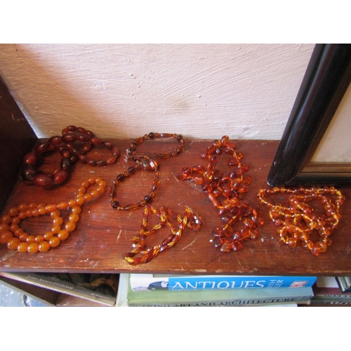 85 - Six Amber Bead Necklaces