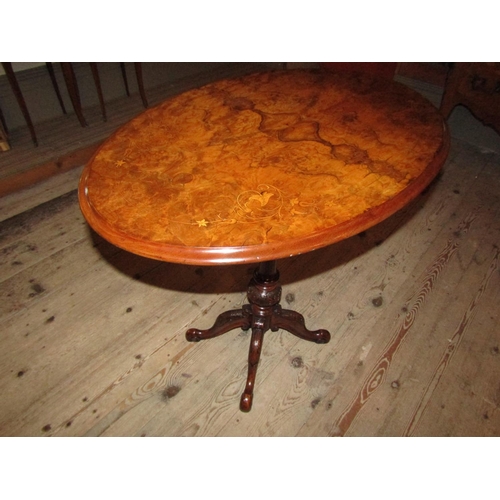 1039 - Early Victorian Figured Walnut Tip Up Wine Table Oval Form Well Carved Quatrefoil Base Approximately... 