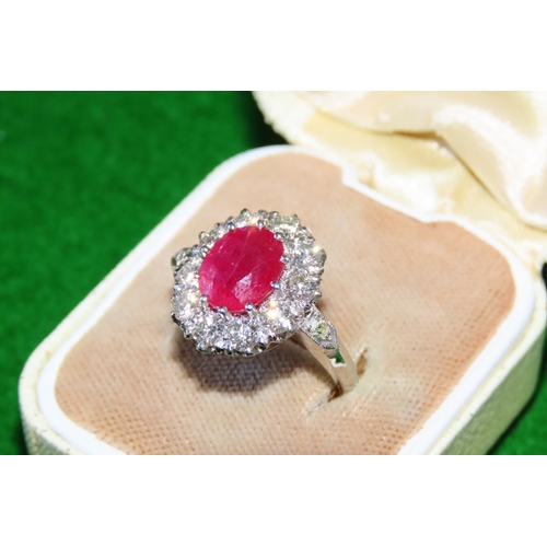 1056 - Ruby and Diamond Cluster Ring Mounted on Platinum and 14 Carat Gold Band Size N and a Half