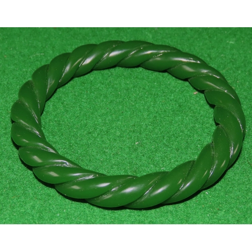 1069 - Carved Apple Green Jade Bangle Twist Motif Design 6cm Inner Diameter