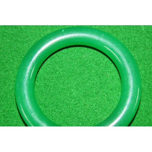 1071 - Carved Green Jade Ladies Bangle 6cm Inner Diameter