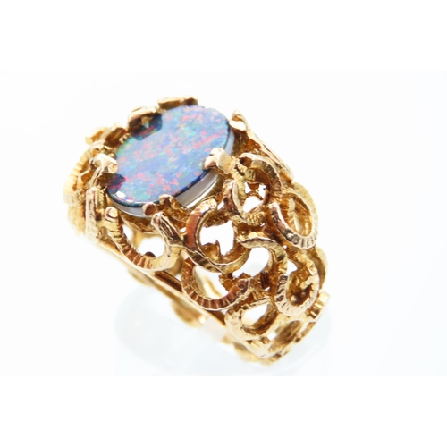 110 - Opal Centre Stone Ring Mounted on 9 Carat Yellow Gold Detailed Band Ring Size M