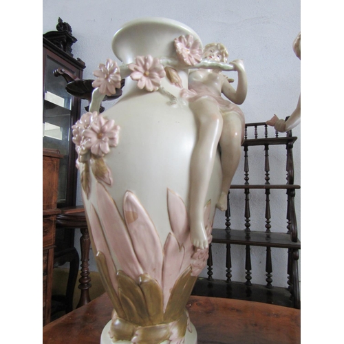 1125 - Pair of Porcelain Vases with Figural Decoration Each Approximately 15 Inches High