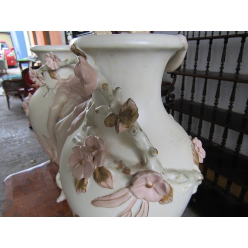 1125 - Pair of Porcelain Vases with Figural Decoration Each Approximately 15 Inches High