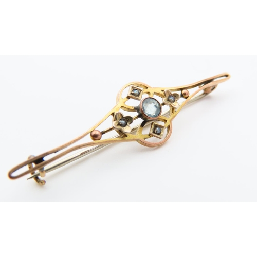 119 - Aquamarine Centre Stone 9 Carat Yellow Gold Bar Brooch with Scroll and Filigree Decoration 5cm Wide