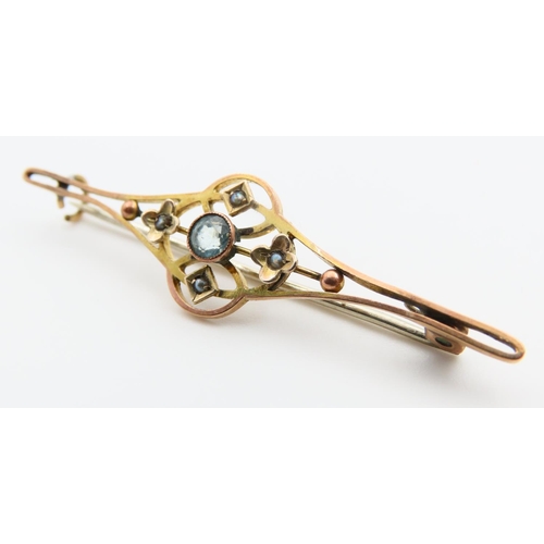 119 - Aquamarine Centre Stone 9 Carat Yellow Gold Bar Brooch with Scroll and Filigree Decoration 5cm Wide