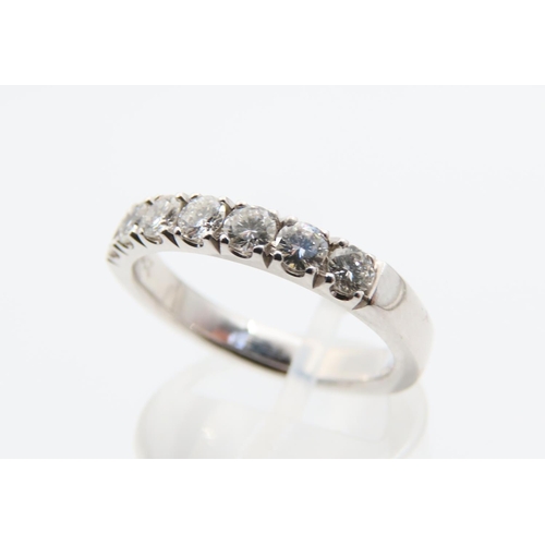 124 - Seven Diamond Half Eternity Ring 18 Carat White Gold Size N Rub Over Setting