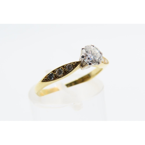 125 - 18 Carat Yellow Gold Diamond solitaire Ring with Three Further Diamonds to Either Shoulder Size L