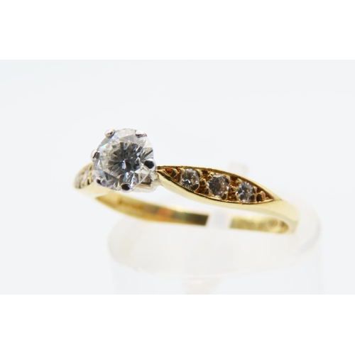 125 - 18 Carat Yellow Gold Diamond solitaire Ring with Three Further Diamonds to Either Shoulder Size L