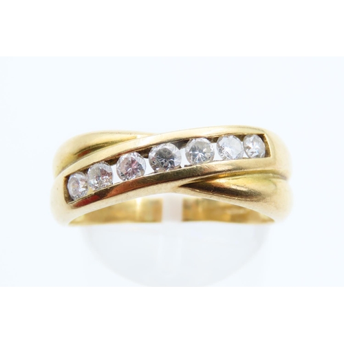 134 - 18 Carat Yellow Gold Cross Over Ring Inset with Diamonds Attractively Detailed Size R