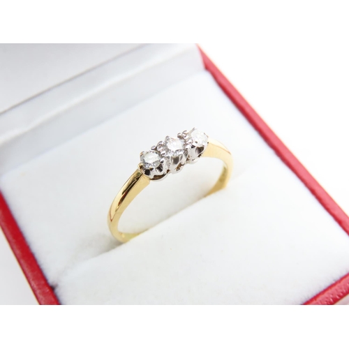 149 - Three Stone Diamond Ring Platinum Set Mounted 18 Carat Yellow Gold Band Ring Size O and a Half